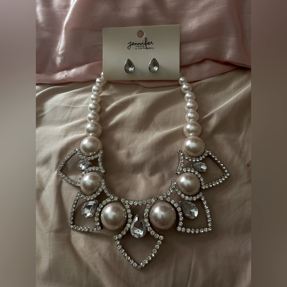 Beautiful artificial jewelry. Pearl with studded necklace and earring set.